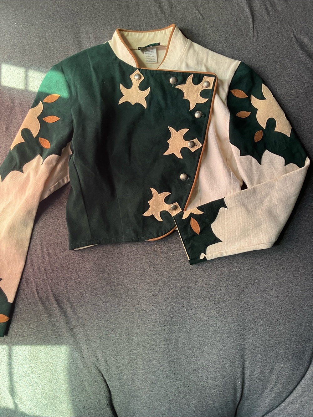 Women’s green and tan horse show jacket